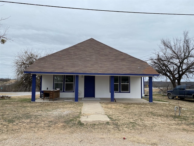 view of front of property featuring a patio