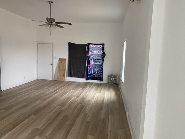 empty room featuring ceiling fan and wood-type flooring