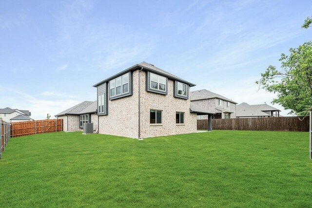 837 Rusty Run Dr, Midlothian, TX 76065 - rear view of house featuring central AC unit and brick siding