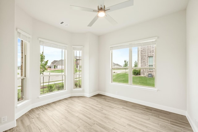 837 Rusty Run Dr, Midlothian, TX 76065 - empty room with a ceiling fan, baseboards, and light wood-style floors