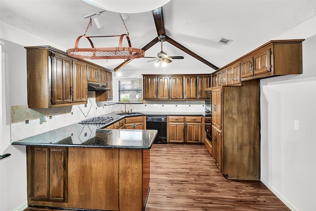 kitchen with backsplash, kitchen peninsula, sink, and vaulted ceiling with beams