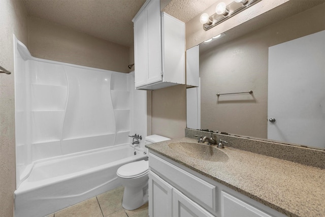 full bathroom featuring shower / washtub combination, vanity, a textured ceiling, tile patterned floors, and toilet