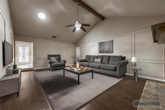 living room with vaulted ceiling with beams, dark wood-type flooring, and ceiling fan