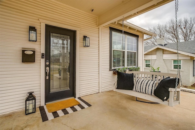 property entrance with a porch