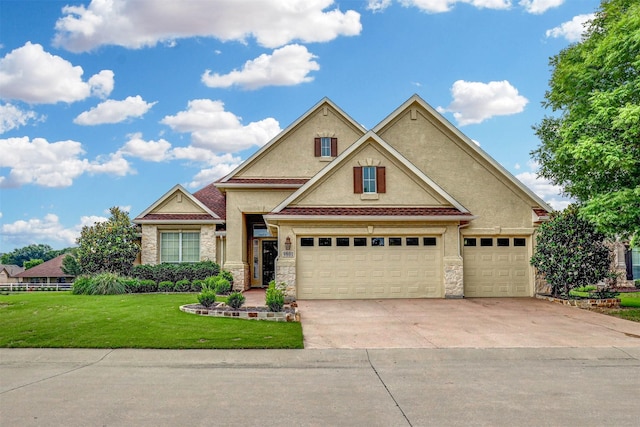 view of front facade with a garage and a front yard