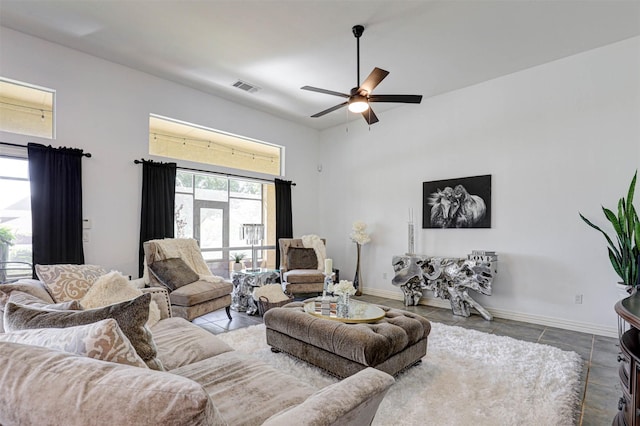 9801 Georgia Ave, Denton, TX 76207 - living room with a ceiling fan, tile patterned flooring, and baseboards