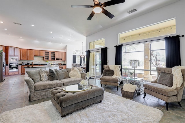 9801 Georgia Ave, Denton, TX 76207 - tiled living room featuring recessed lighting, a ceiling fan, and vaulted ceiling