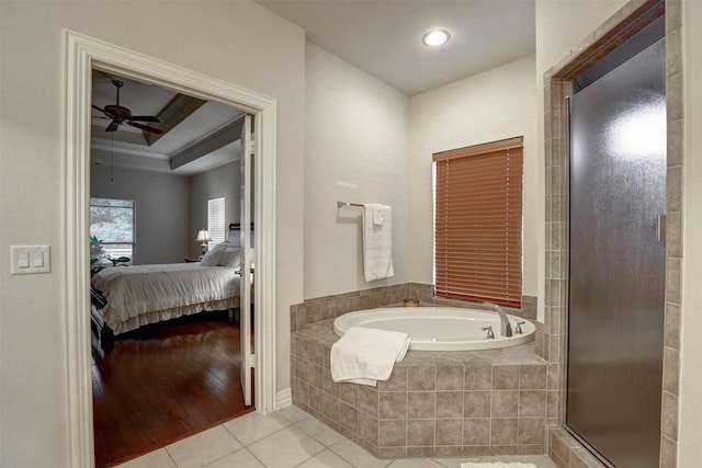 bathroom with tile patterned flooring, independent shower and bath, and ceiling fan