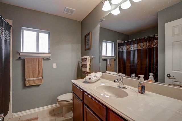 9801 Georgia Ave, Denton, TX 76207 - full bathroom featuring toilet, tile patterned floors, vanity, baseboards, and a shower with curtain