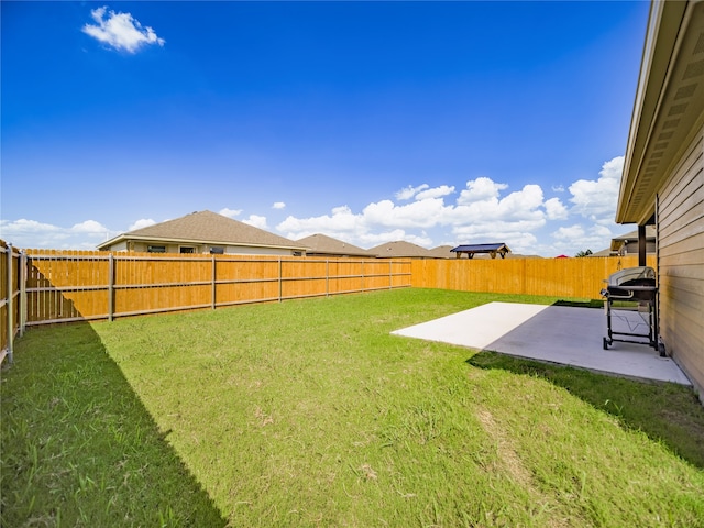 view of yard with a patio area