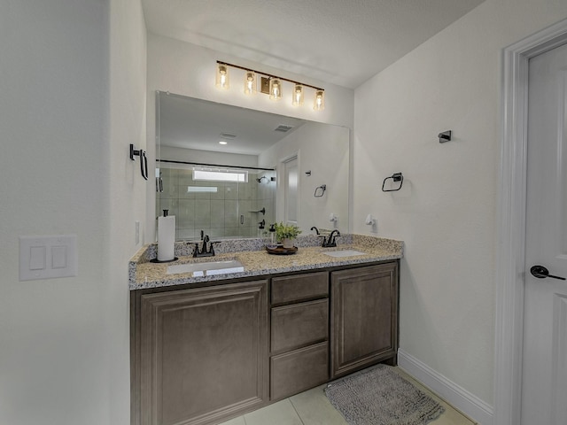 bathroom with walk in shower, tile patterned floors, and vanity