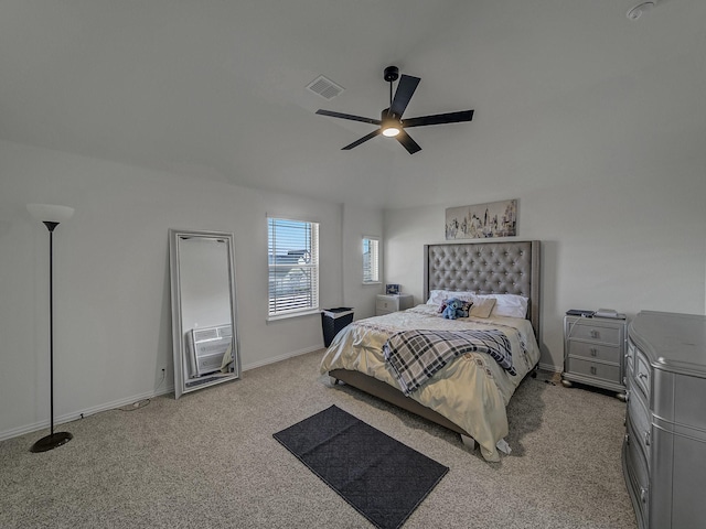 carpeted bedroom with cooling unit and ceiling fan