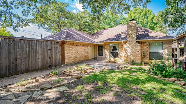 view of front of home featuring a patio