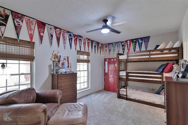 carpeted bedroom with a textured ceiling