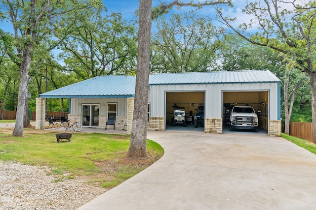 86593 N State Highway 289, Pottsboro, TX 75076 - exterior space with a garage, an outdoor structure, and a front lawn