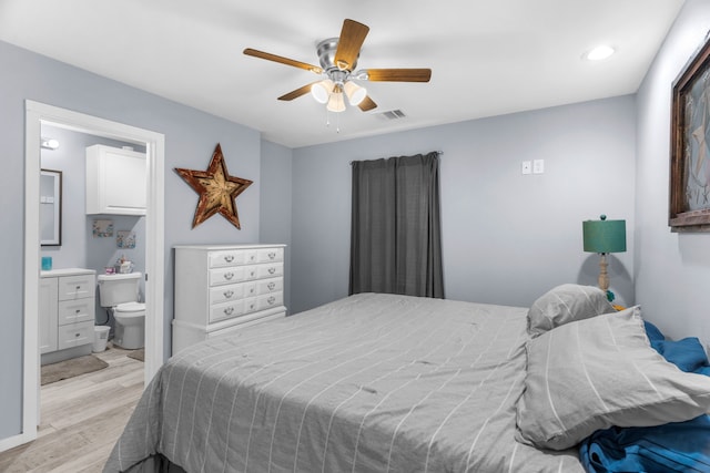 86593 N State Highway 289, Pottsboro, TX 75076 - bedroom featuring connected bathroom, ceiling fan, and light hardwood / wood-style flooring