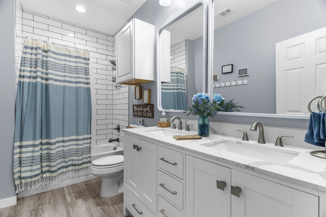 86593 N State Highway 289, Pottsboro, TX 75076 - full bathroom with shower / tub combo, vanity, hardwood / wood-style floors, and toilet