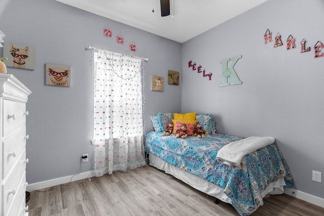 86593 N State Highway 289, Pottsboro, TX 75076 - bedroom with hardwood / wood-style floors and ceiling fan