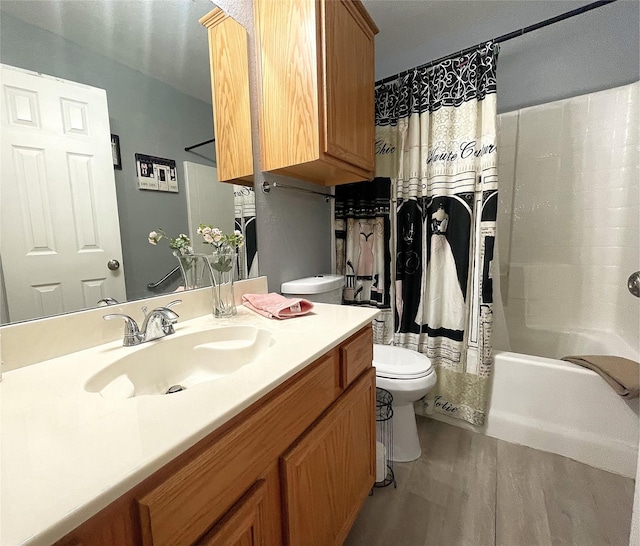 full bathroom with shower / tub combo with curtain, vanity, toilet, and wood-type flooring