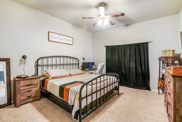 bedroom featuring light carpet and ceiling fan