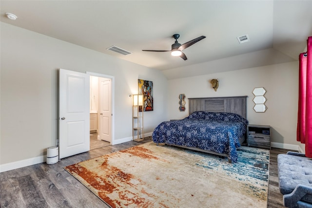 bedroom featuring hardwood / wood-style flooring, vaulted ceiling, and ceiling fan