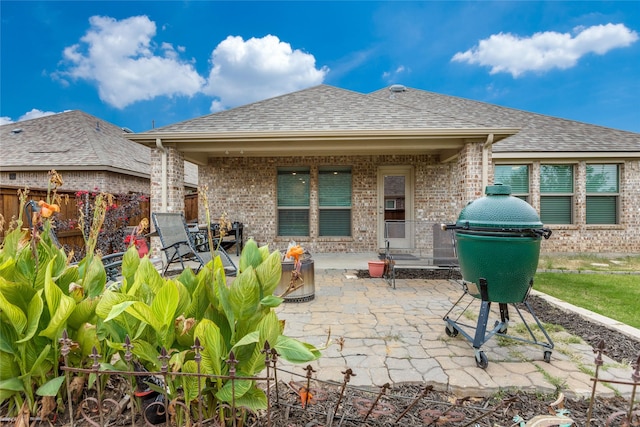 rear view of house with a patio area