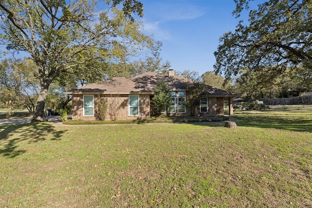 view of front of home with a front yard