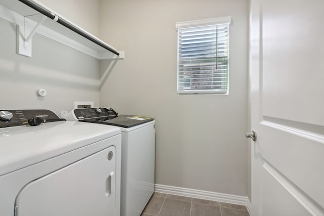 laundry area with washing machine and dryer