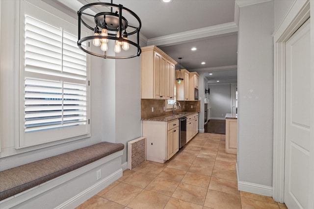 kitchen featuring dishwasher, sink, a chandelier, hanging light fixtures, and light stone countertops