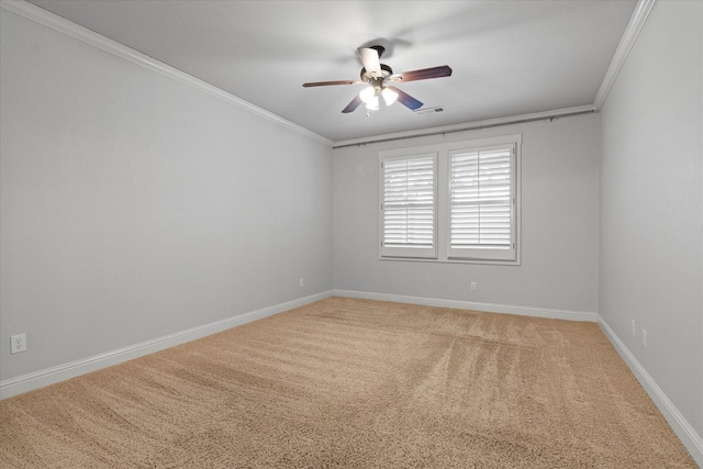 unfurnished room featuring crown molding, ceiling fan, and carpet flooring