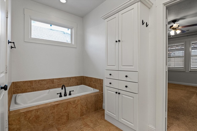 bathroom featuring a relaxing tiled tub