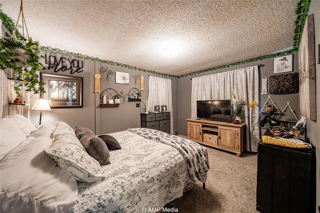 carpeted bedroom with a textured ceiling