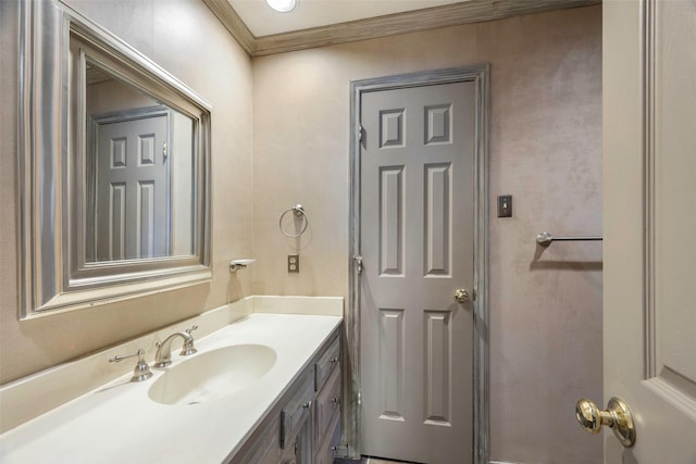 bathroom featuring vanity and crown molding