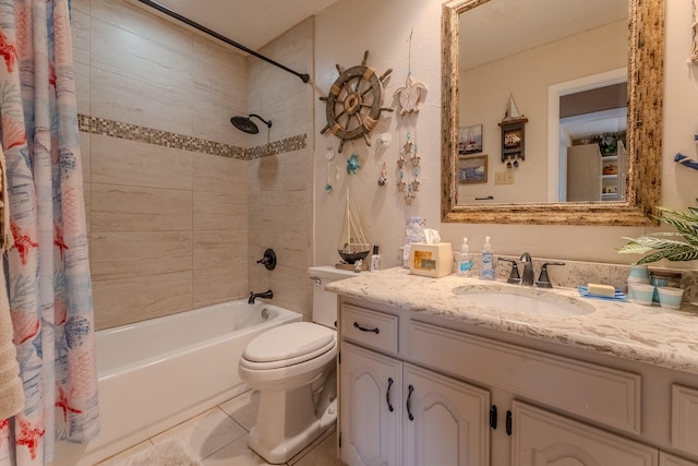 full bathroom with tile patterned flooring, vanity, shower / bath combo with shower curtain, and toilet