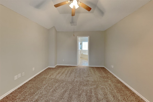 spare room with carpet and ceiling fan