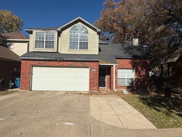 front facade with a garage