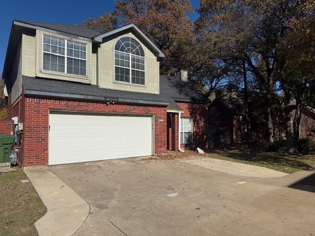 front of property featuring a garage