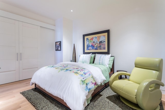 bedroom featuring hardwood / wood-style flooring