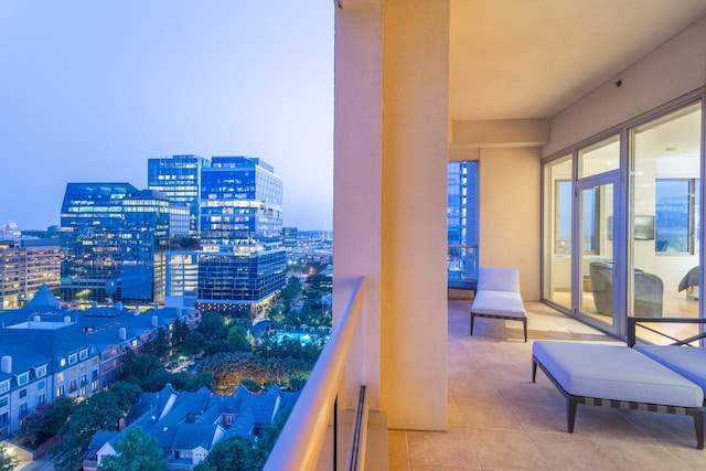 view of balcony at dusk