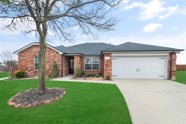 single story home featuring a garage and a front lawn