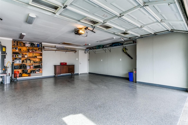 garage featuring a garage door opener and water heater