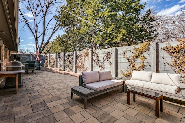 view of patio with an outdoor living space