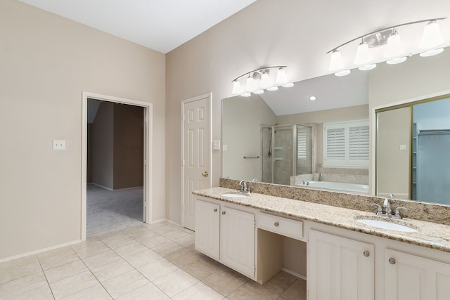 bathroom with vanity, tile patterned flooring, vaulted ceiling, and shower with separate bathtub