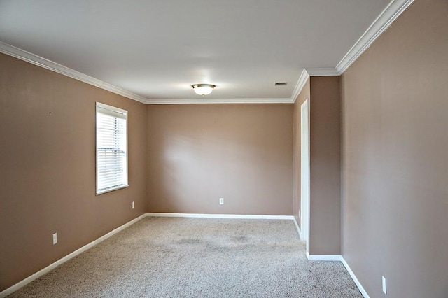 carpeted empty room with ornamental molding