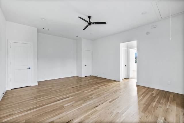 spare room featuring ceiling fan and light wood-type flooring