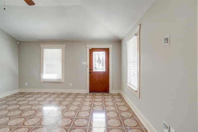 entryway featuring vaulted ceiling, ceiling fan, and plenty of natural light