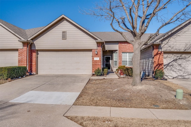 ranch-style home with a garage