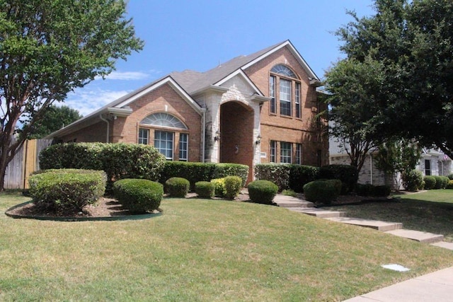 view of front facade featuring a front yard