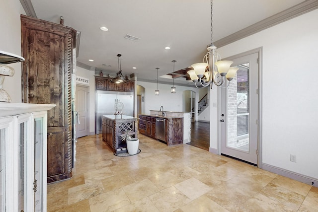 kitchen with arched walkways, visible vents, stainless steel dishwasher, ornamental molding, and a center island with sink