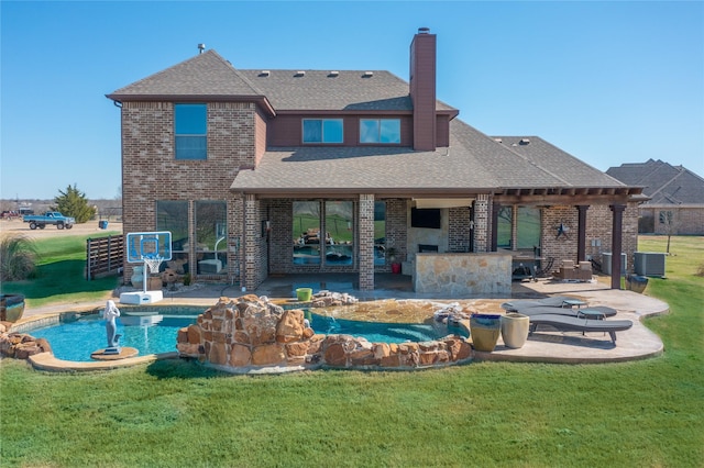 rear view of house with roof with shingles, a yard, a patio area, central AC, and brick siding